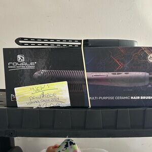 New ceramic hair brush purchased at the women’s show used once